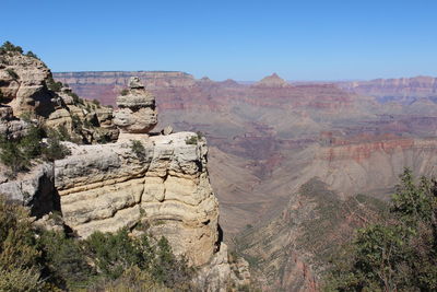 Scenic view of rocky mountains against clear sky