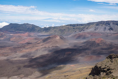 Scenic view of volcanic landscape against sky