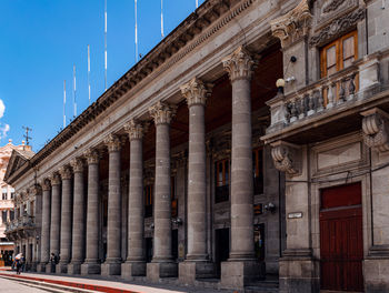 Low angle view of historic building against sky