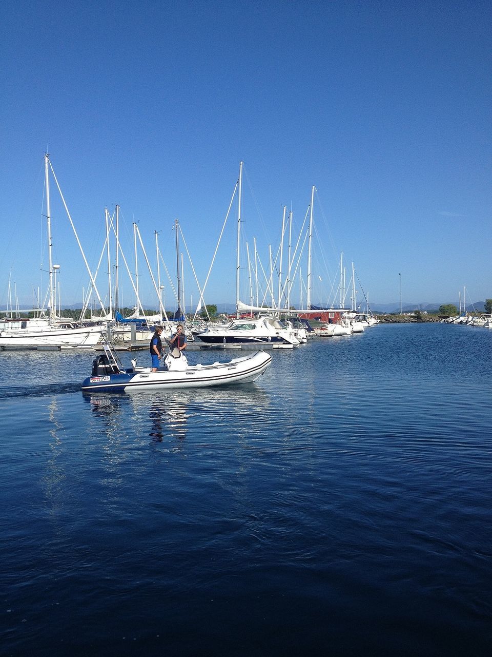 nautical vessel, transportation, boat, mode of transport, water, mast, clear sky, sea, moored, sailboat, copy space, blue, harbor, waterfront, travel, nature, tranquility, tranquil scene, outdoors, sailing