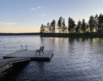 Scenic view of lake against sky during sunset