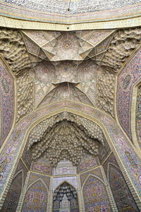 Low angle view of ornate ceiling of building