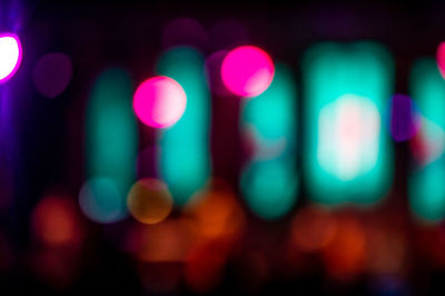 Defocused image of illuminated lights at night