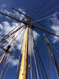 Low angle view of sailboat sailing against sky