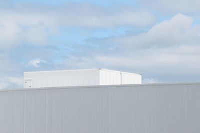 High section of building against cloudy sky