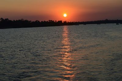 Scenic view of sunset over sea