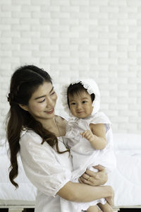 Portrait of mother with daughter