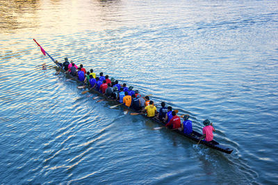 High angle view of crowd rowing boat in river