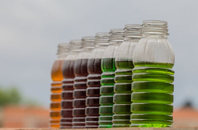 Close-up of drinks in plastic bottles