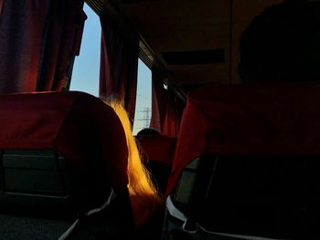 Rear view of people sitting in bus