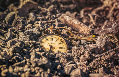 Close-up of clock against blurred background