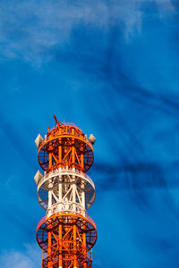 Low angle view of building against blue sky