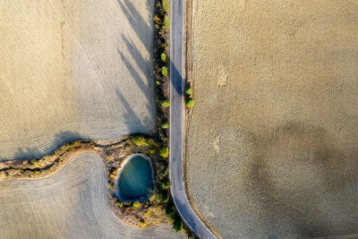 High angle view of road by wall