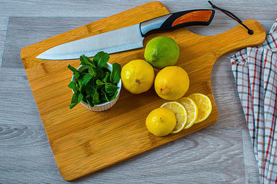 High angle view of fruits on cutting board