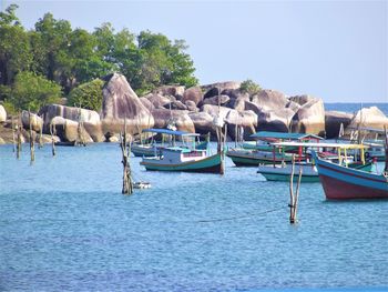 The boat is waiting for tourists around the tanjung tinggi beach tourist attraction, belitung island
