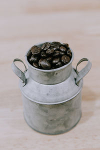 High angle view of beans in container on table