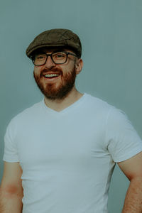 Portrait of young man against white background