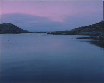 Scenic view of sea against sky at sunset