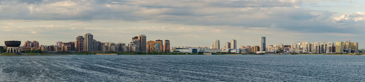 Kazan, russia-panorama of the modern part of the city view from the kremlin embankment