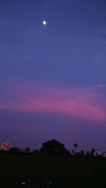 Scenic view of landscape against sky at night