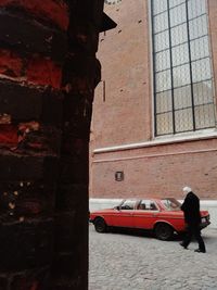 Car on street against building