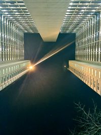 Illuminated buildings in city at night