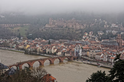 High angle view of bridge over river in town