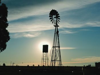 Low angle view of traditional windmill against sky