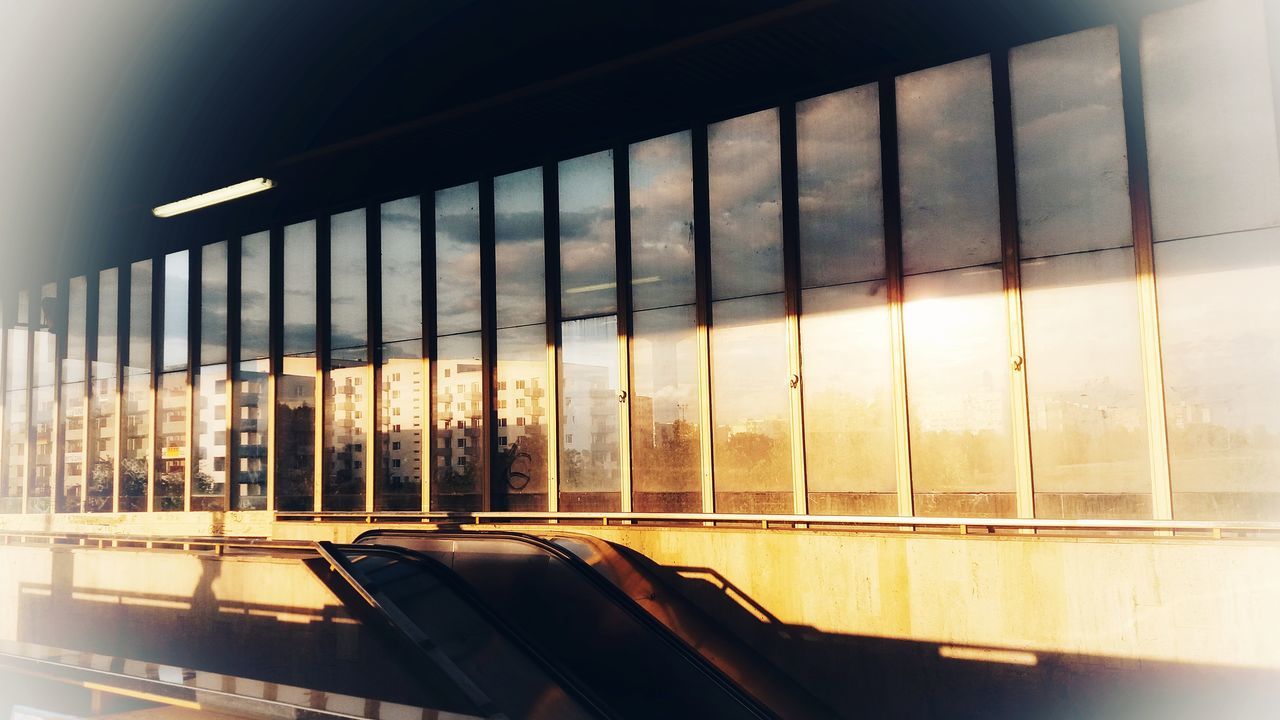 window, glass - material, architecture, no people, built structure, reflection, transparent, transportation, nature, car, indoors, sunlight, day, motor vehicle, sky, mode of transportation, cloud - sky, vehicle interior, modern, glass