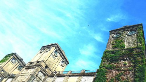 Low angle view of built structure against blue sky