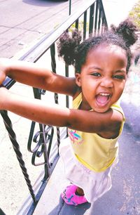 Portrait of smiling girl in playground
