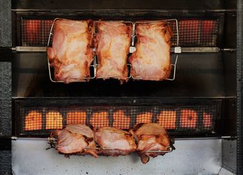 High angle view of meat on barbecue grill