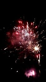 Low angle view of firework display