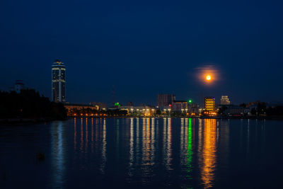 View of the embankment in yekaterinburg on a full moon