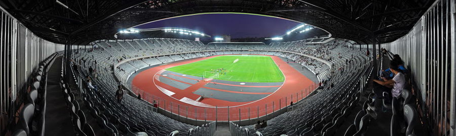 Illuminated light bulb on soccer field