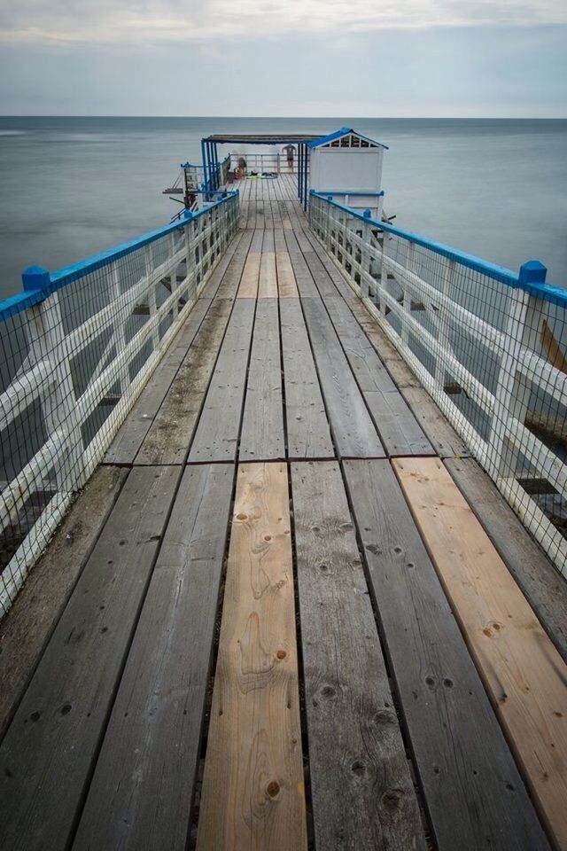 WOODEN PIER ON SEA