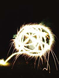 Close-up of firework display at night