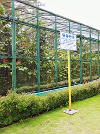 Information sign on fence