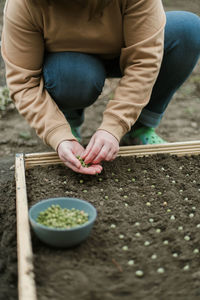 Midsection of woman preparing food