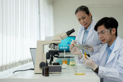 Female doctor working in laboratory