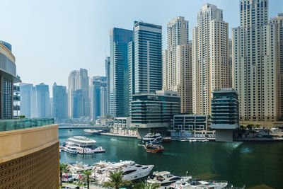 Dubai marina. modern buildings in city against sky
