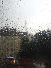 Full frame shot of wet glass window