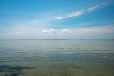 Scenic view of sea against blue sky