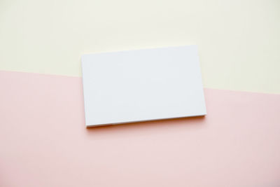 Close-up of paper over white background