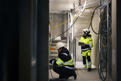 Construction workers working at building site