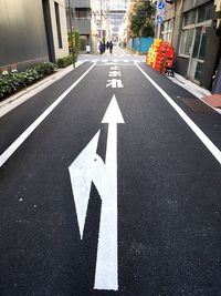 Road sign on street in city