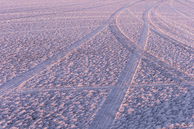 High angle view of road amidst field