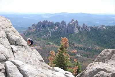 High angle view of man climbing on mountain