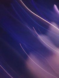 Close-up of vapor trail in blue sky