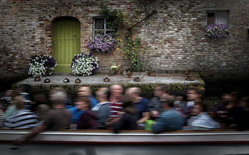 Blurred motion pf people in boat